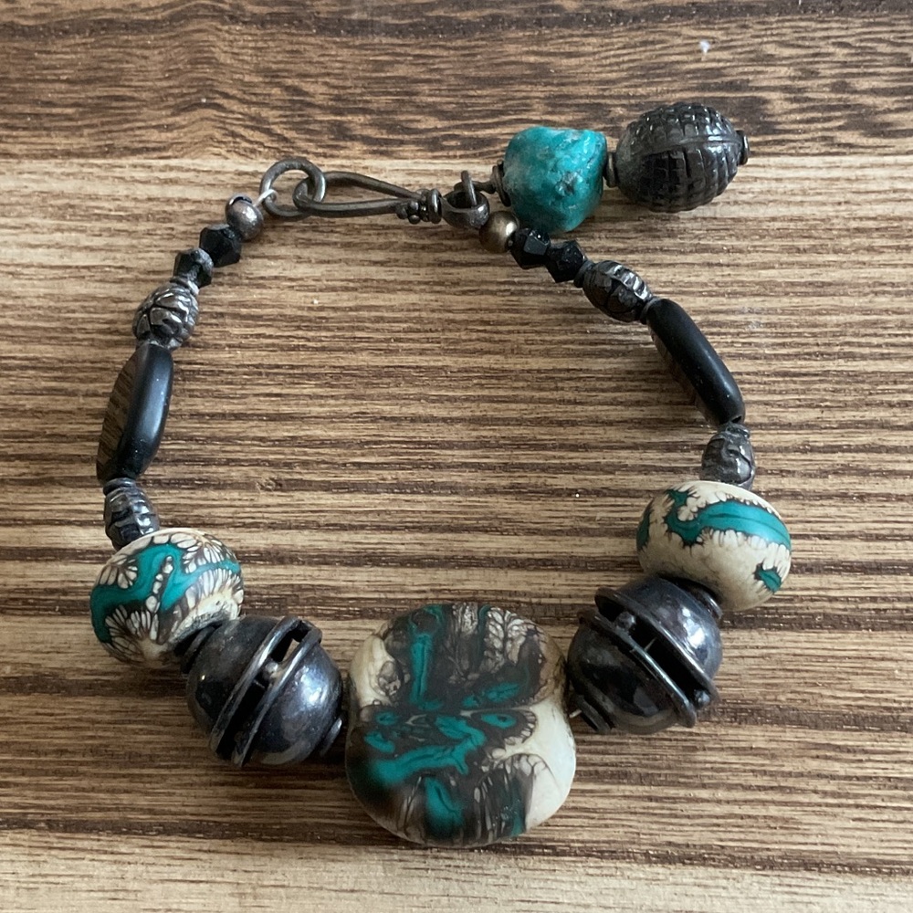 Handcrafted silver Beaded Bracelet with Teal and Black Accents